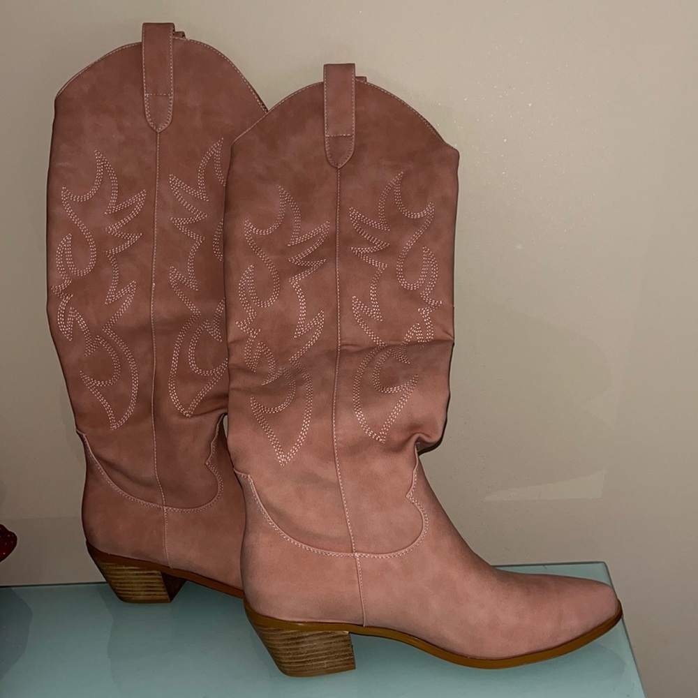 Pink cowboy boots with pink stitching!